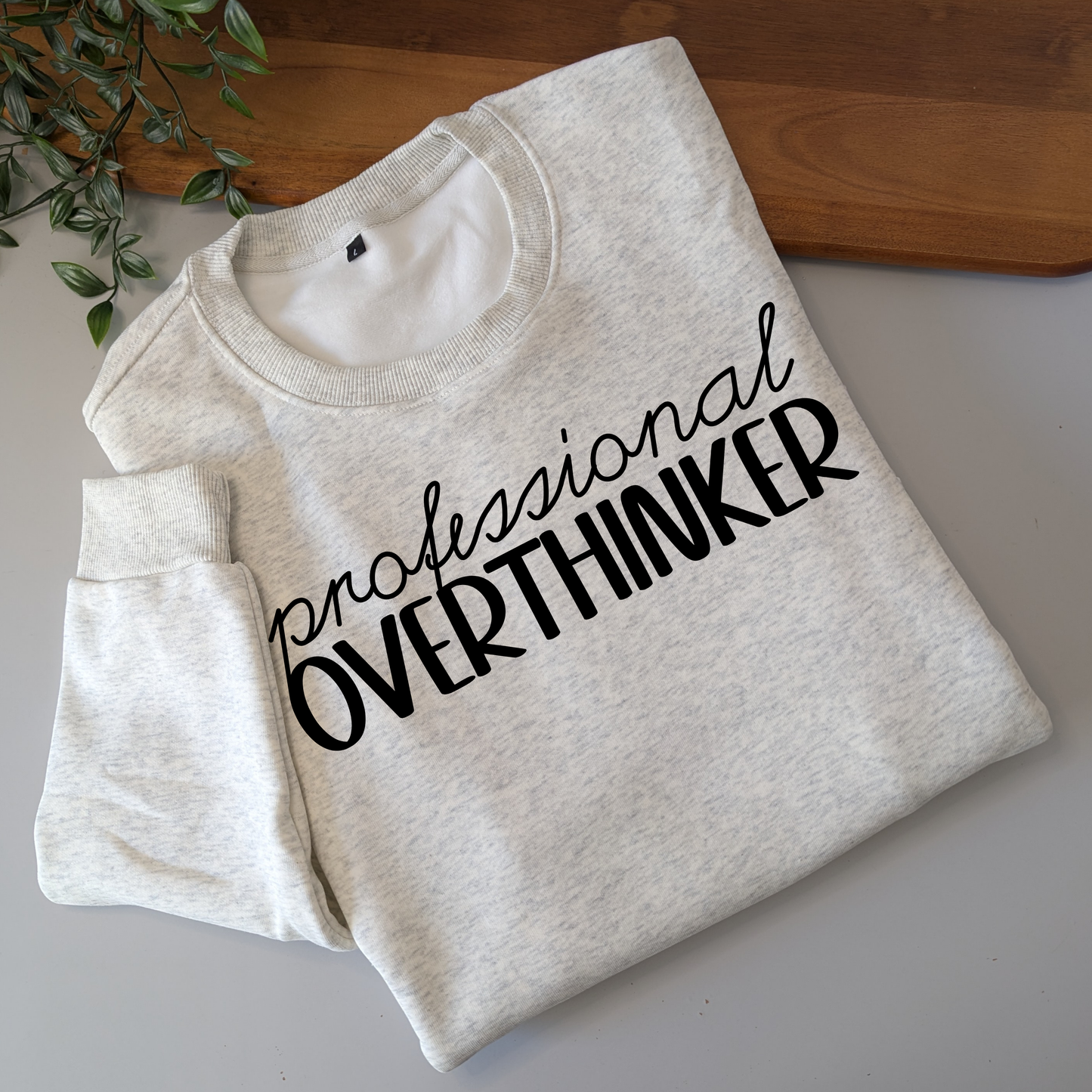 Professional Overthinker womens crewneck jumper. Indigo blue fleece jumper with white decal