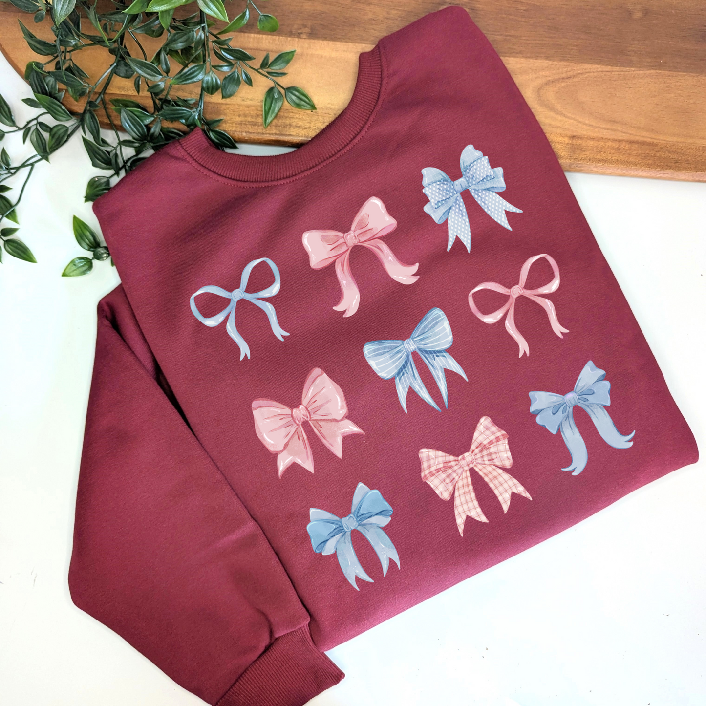 Pastel watercolour bows cute fleece women's jumper. Soft fleece want jumper. Denim Blue or cream jumper. Girly bows.