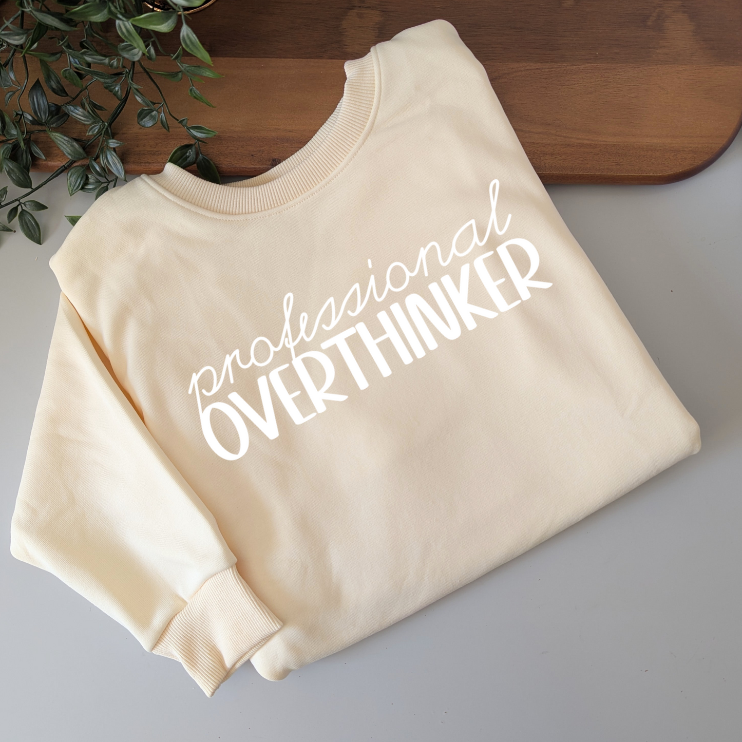Professional Overthinker womens crewneck jumper. Indigo blue fleece jumper with white decal