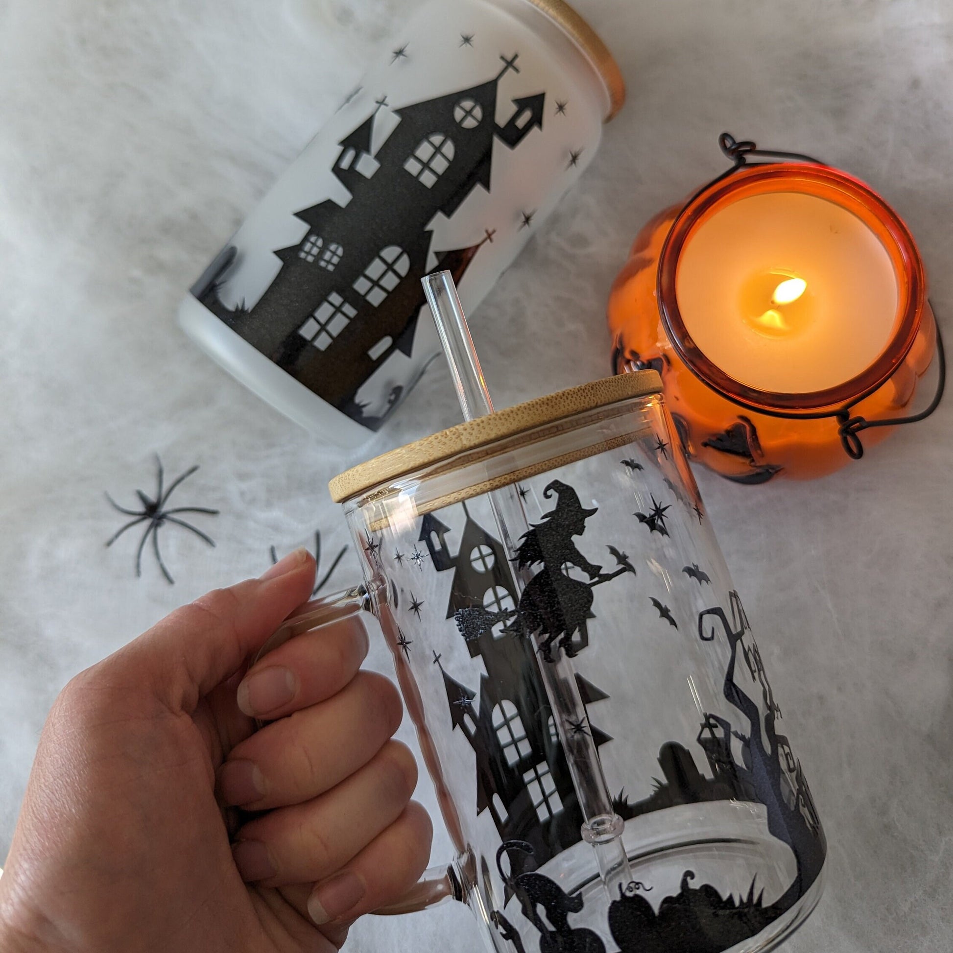 Witches home Halloween glittery 15oz glass mug or 16oz glass can cup with bamboo lid & reusable straw. Witches garden. Glitter. Coffee mug