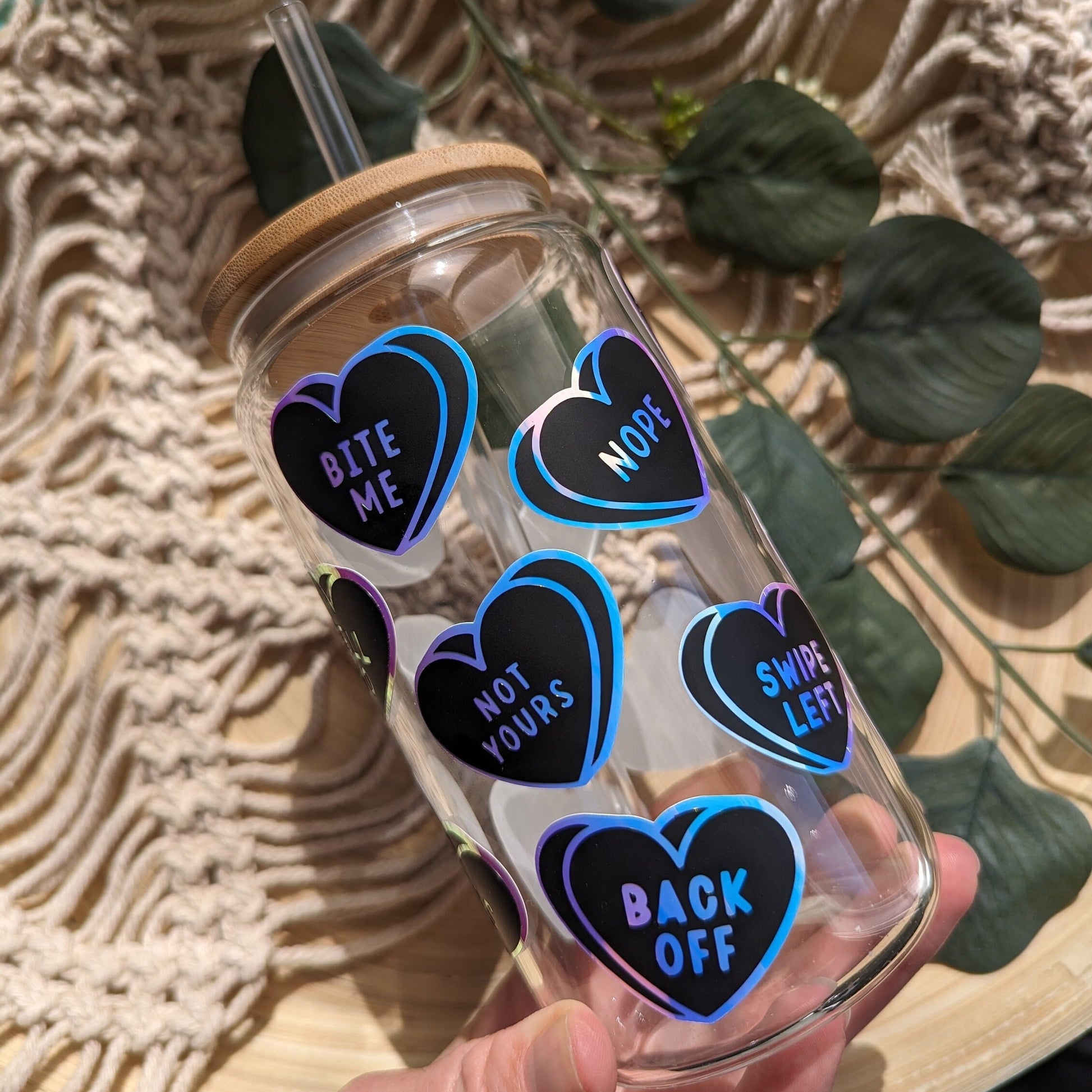 Black and holographic candy hearts. Sweet or sour theme 16oz glass can or 17oz glass mug with bamboo lid & reusable plastic straw.Coffee cup