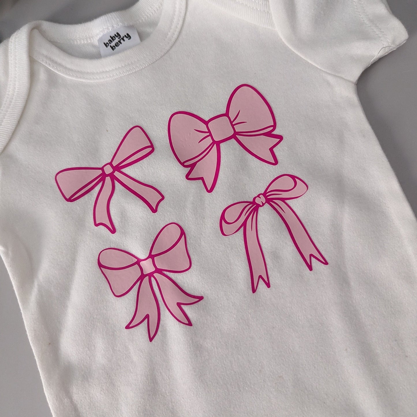 Pretty Pink Bows Baby Bodysuit. Baby shirt. Girly Bows. Pink. White bodysuit